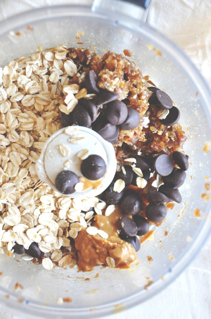 Food processor filled with ingredients for making No-Bake Cookie Bars
