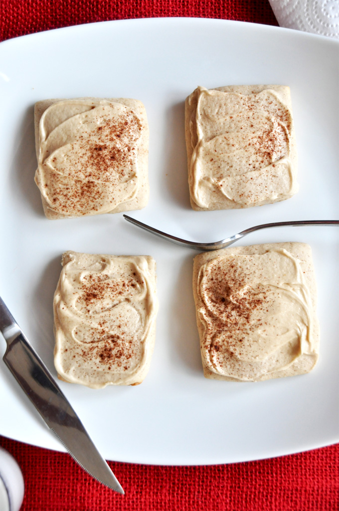 Plate with a batch of our French Toast Sugar Cookies recipe topped with cinnamon