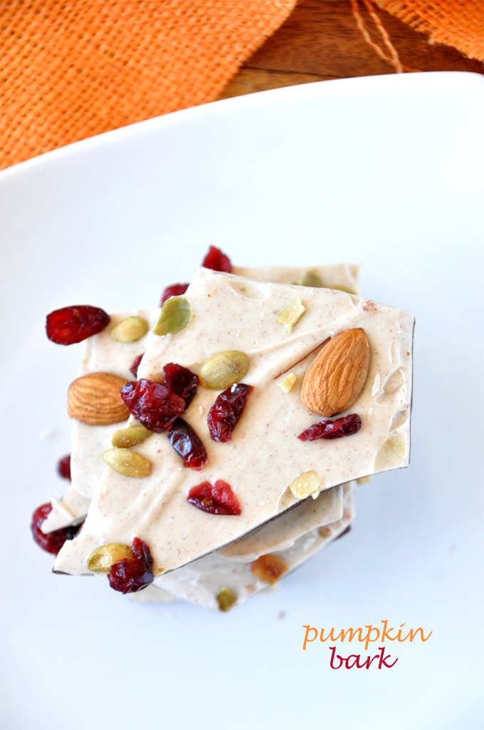 pumpkin bark! Minimalist Baker Stack of pieces of homemade Pumpkin Bark made with dried cranberries and almonds