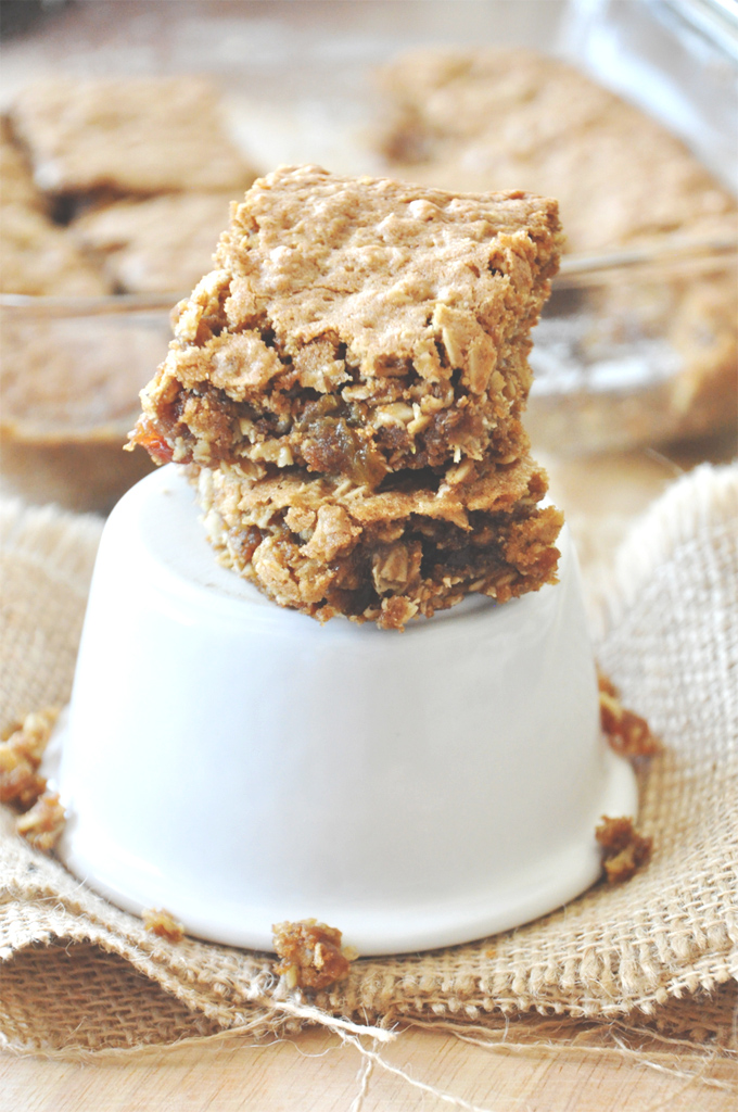 Stack of Chai-Spiced Oatmeal Raisin Bars on a stand