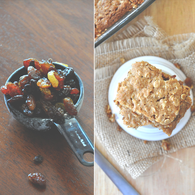 Measuring cup of raisins and stack of homemade Chai-Spiced Oatmeal Raisin Bars