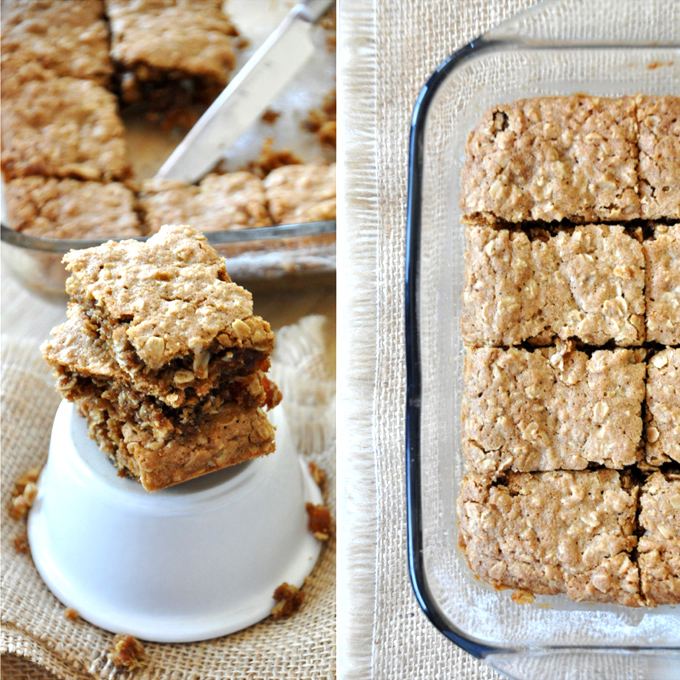 Stack of Chai-Spiced Oatmeal Raisin Bars alongside a pan with the rest of the batch