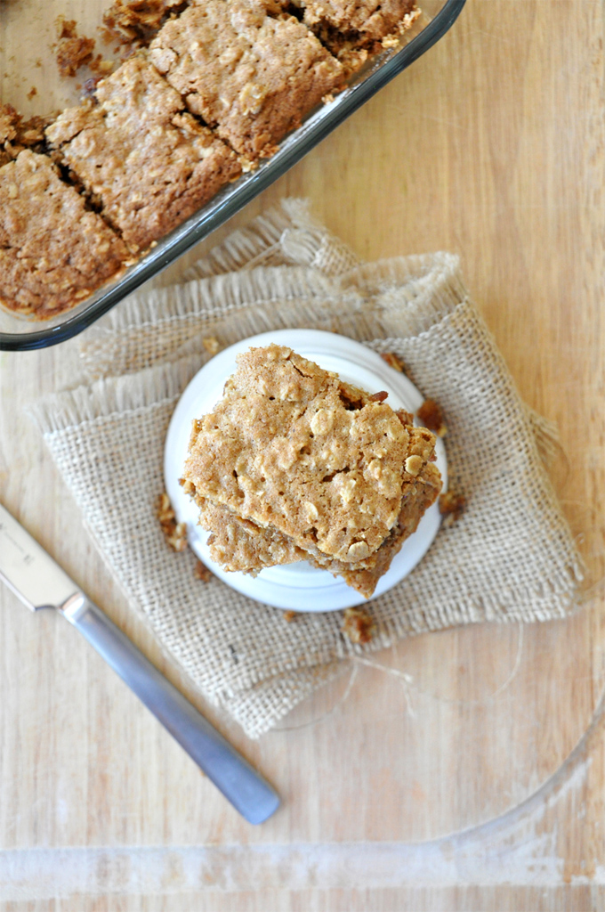 Stacked squares of our Chai-Spiced Oatmeal Raisin Bars for a hearty dessert