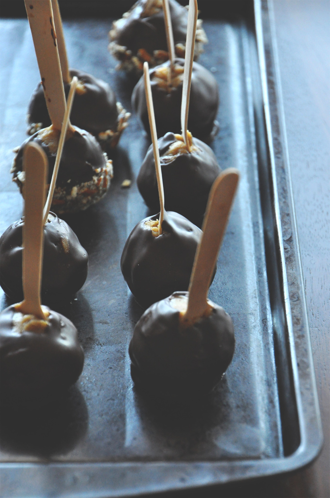 Baking sheet with a batch of our Vegan Chocolate Pumpkin Cookie Dough Pops recipe