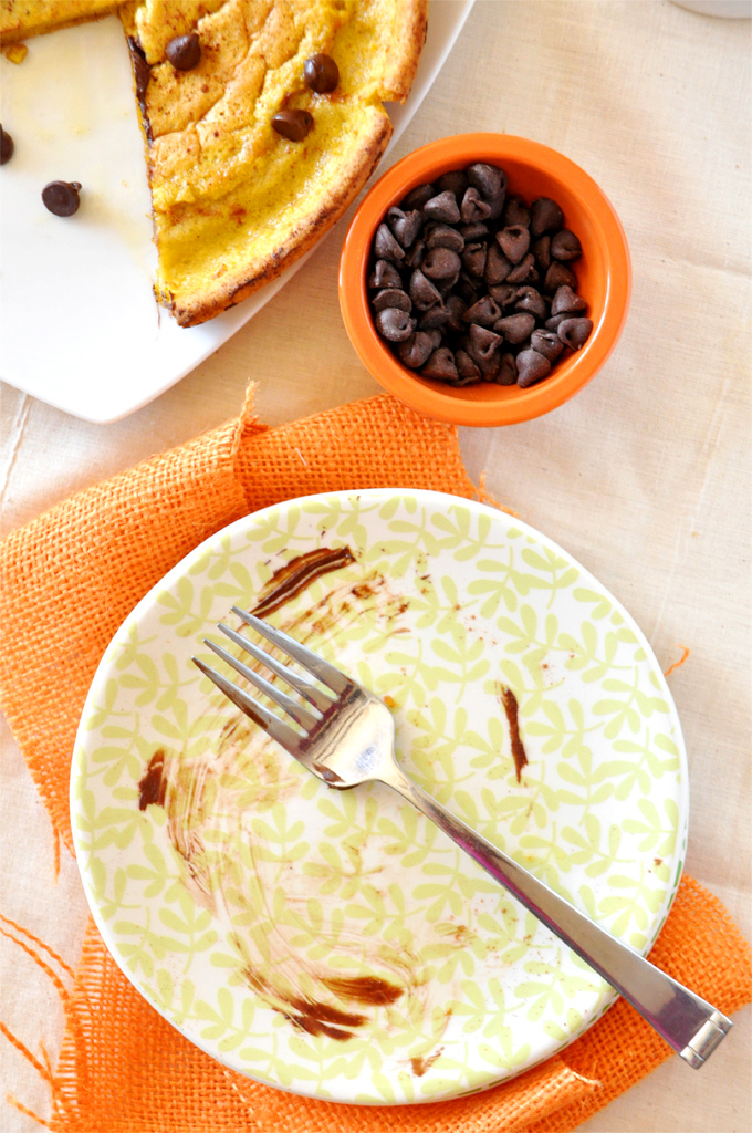 Empty plate that once held a slice of gobbled up Pumpkin Chocolate Chip Dutch Baby