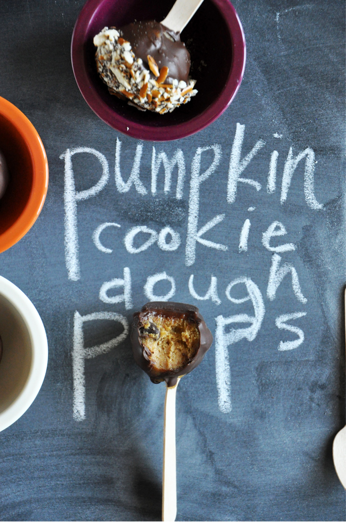 Pumpkin Cookie Dough Pops on a chalkboard and in bowls