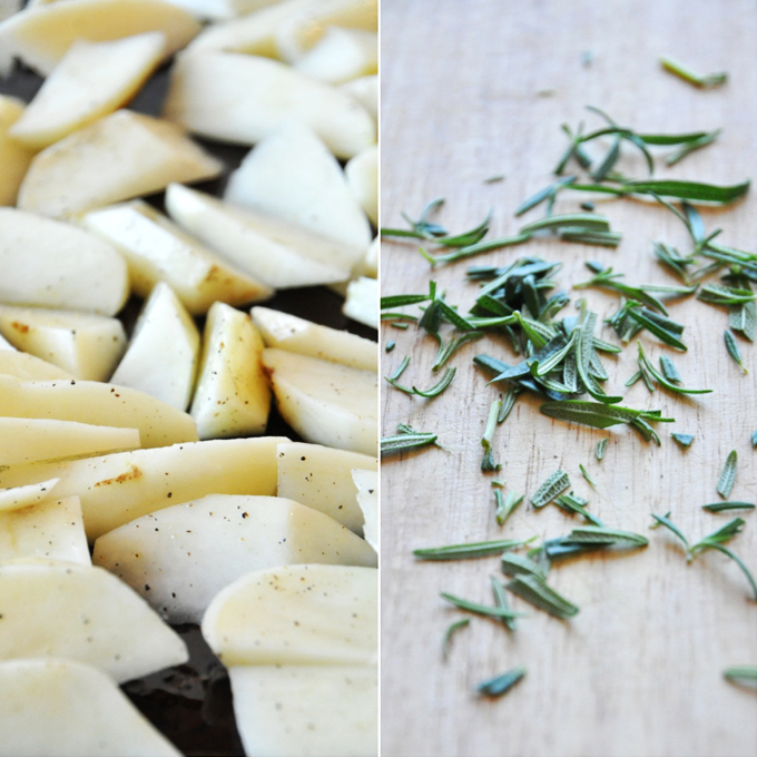Chopped potatoes and rosemary for making Crispy Baked Rosemary Garlic Fries