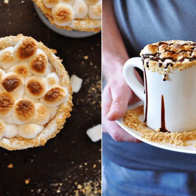 Mugs of our S'mores Hot Chocolate recipe with a toasted marshmallow and graham cracker topping