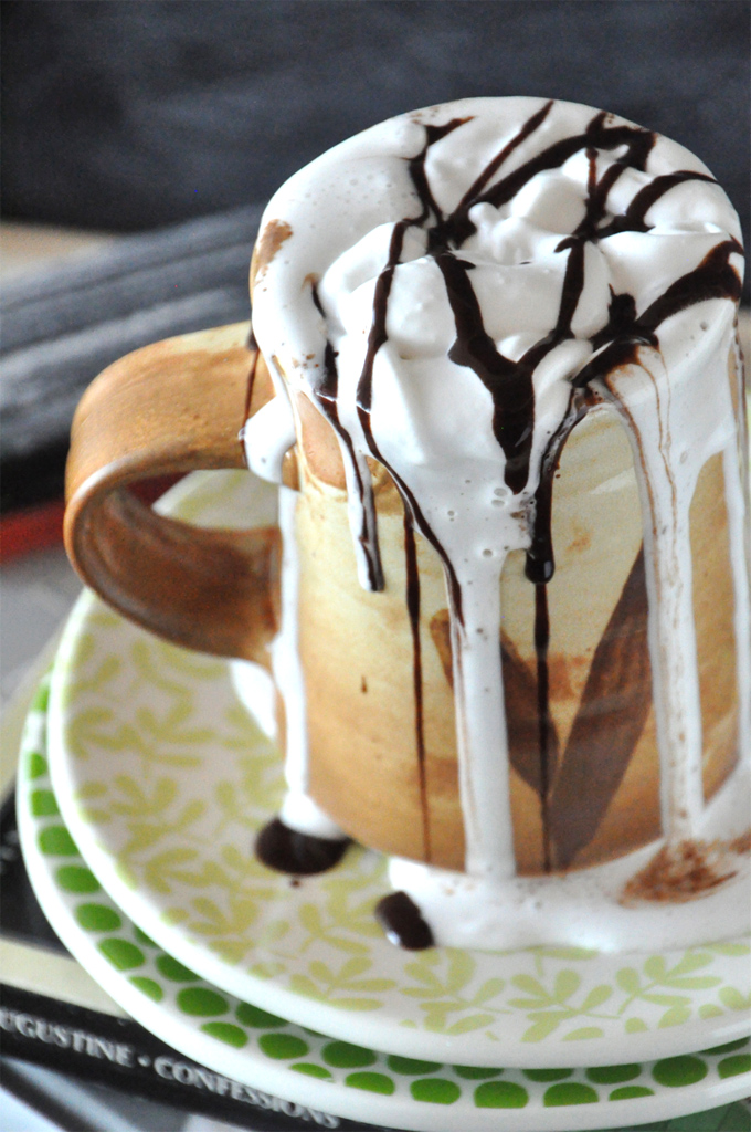 Mug of Mexican Hot Chocolate with Coconut Whipped Cream for a comforting vegan beverage
