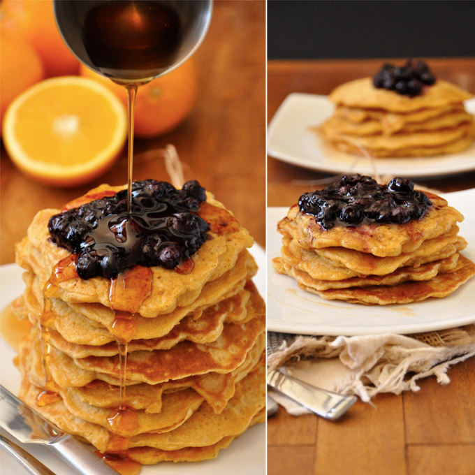 Pouring syrup onto Whole Wheat Griddle Cakes topped with Blueberry Orange Compote