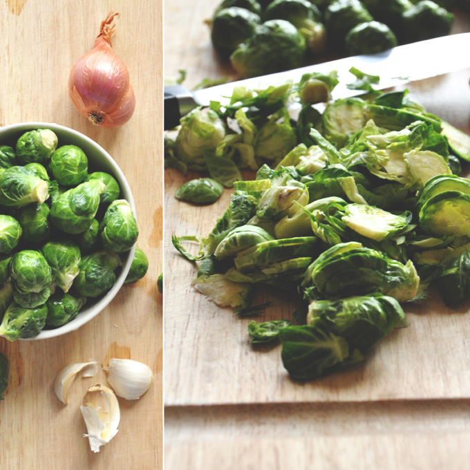 Cutting board with Brussels Sprouts and other ingredients for making healthy shallot dip