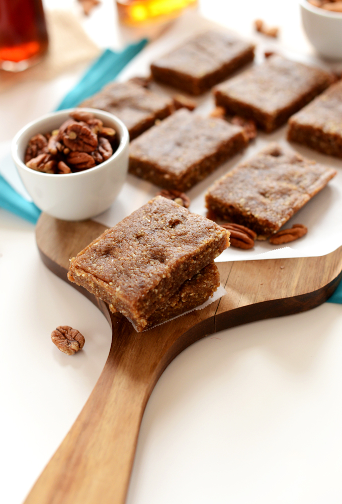 Cutting board filled with a batch of Raw Pecan Pie Bars