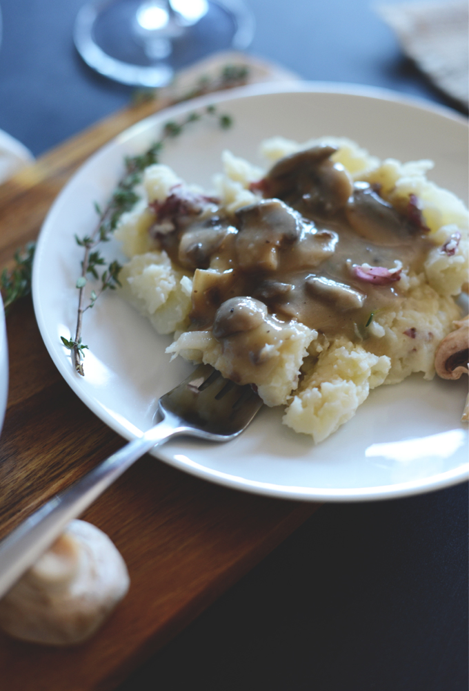Grabbing a bite of Mashed Potatoes with Mushroom Gravy