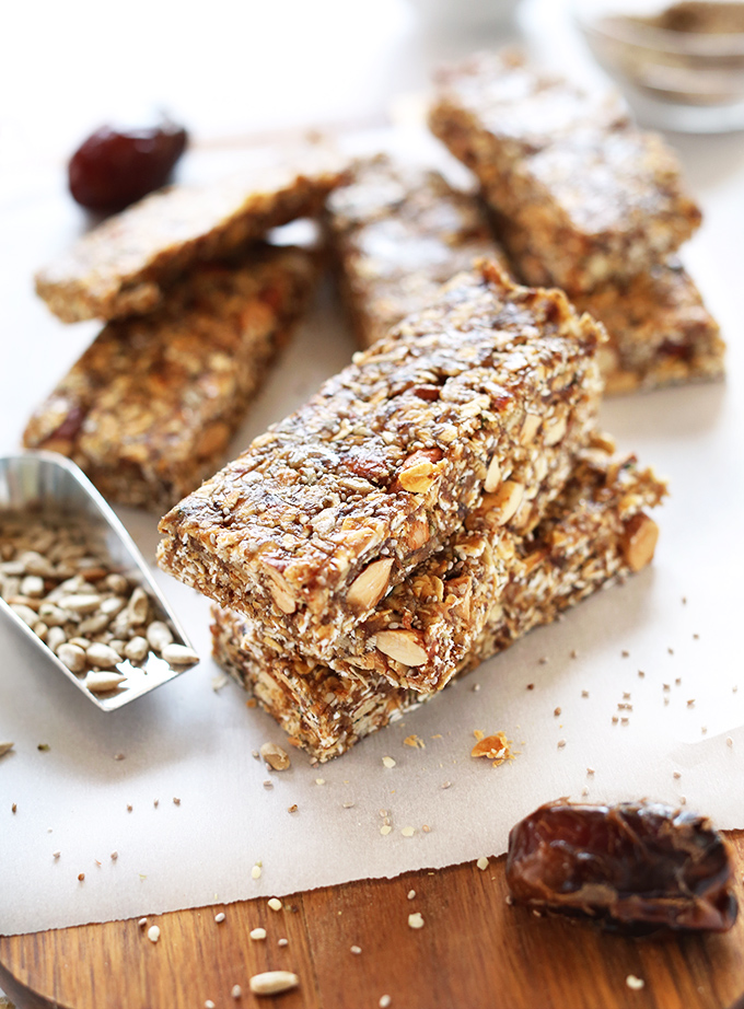 AMAZING super seedy granola bars! Naturally sweetened, #vegan and #glutenfree and SO delicious. Perfect for snacking or taking on road trips
