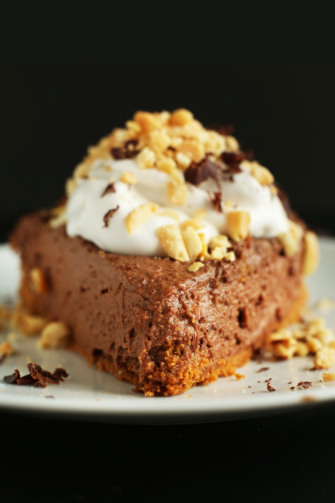 Close up shot of a slice of our creamy Vegan Chocolate PB Mousse Pie