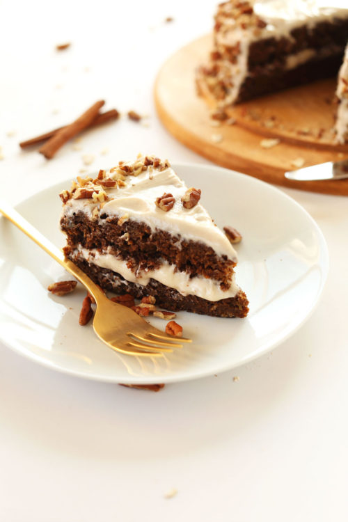 Plate with a slice of Vegan Apple Gingerbread Cake with frosting