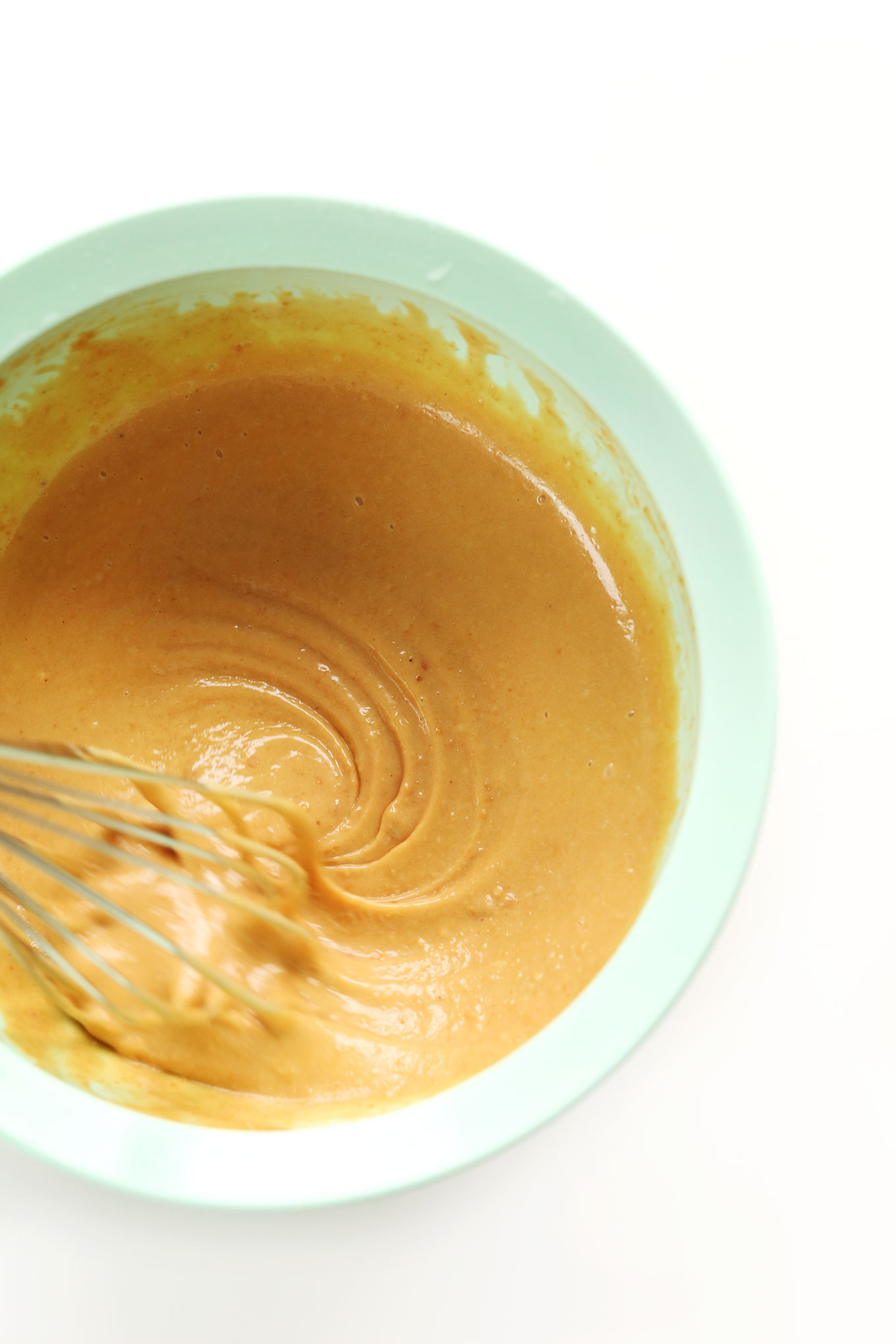 Whisking together ingredients for Asian Cashew Dipping Sauce