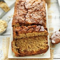 Partially sliced loaf of Vegan GF Nutella Banana Bread