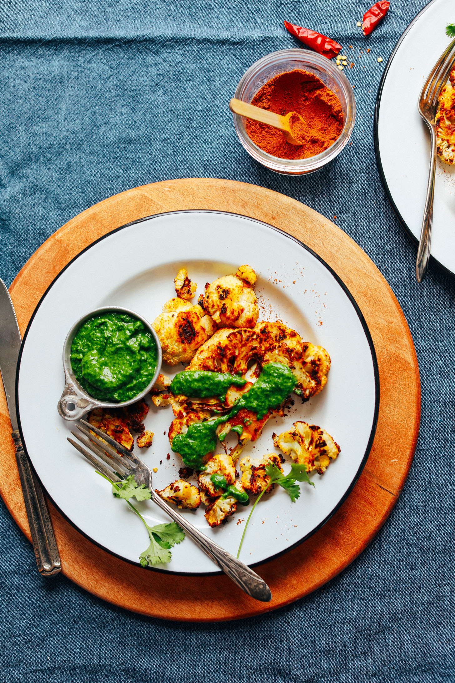 Dinner plate with Shawarma Roasted Cauliflower Steak and a side of Green Chutney