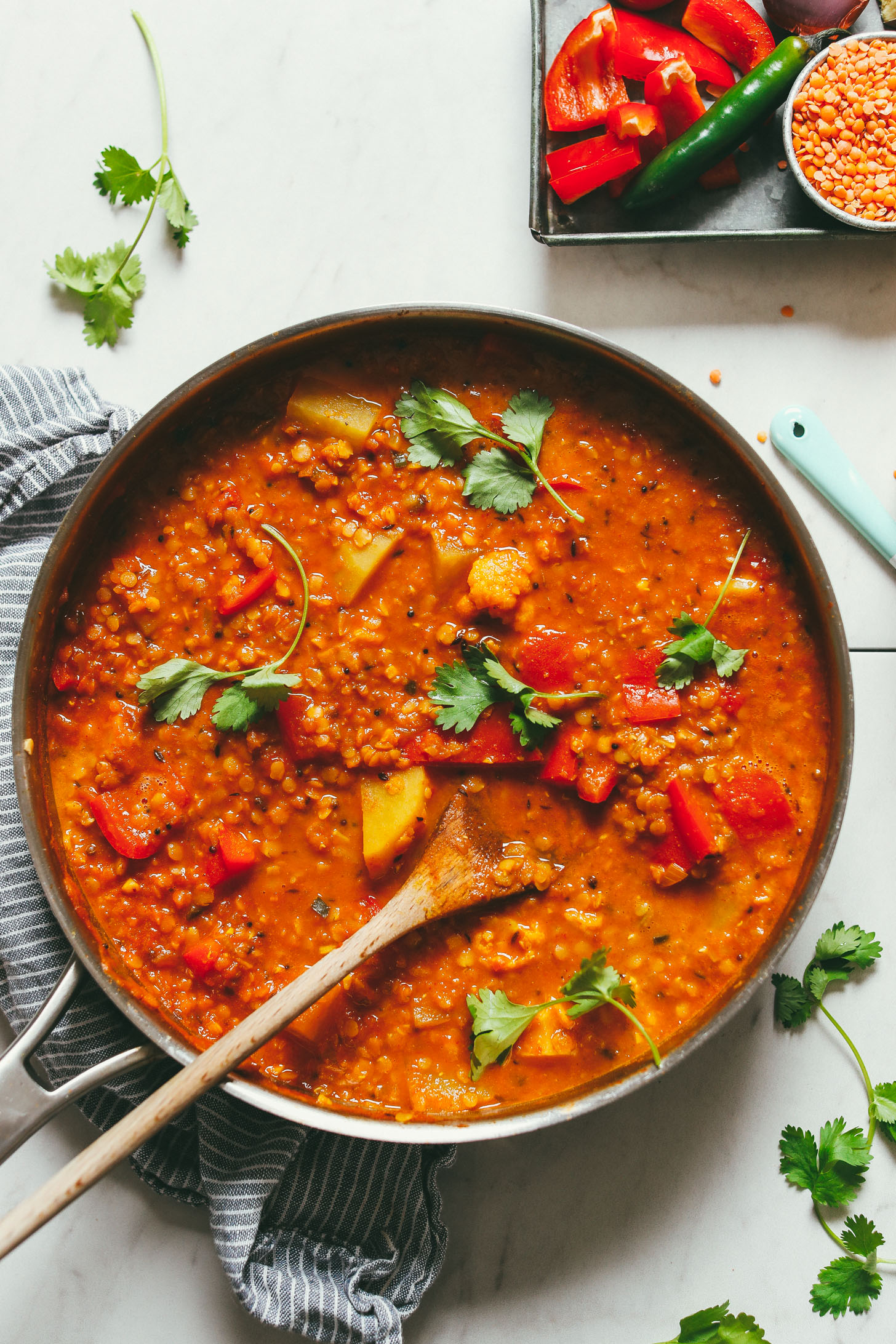 Large pan filled with gluten-free vegan Cauliflower Potato Red Lentil Curry