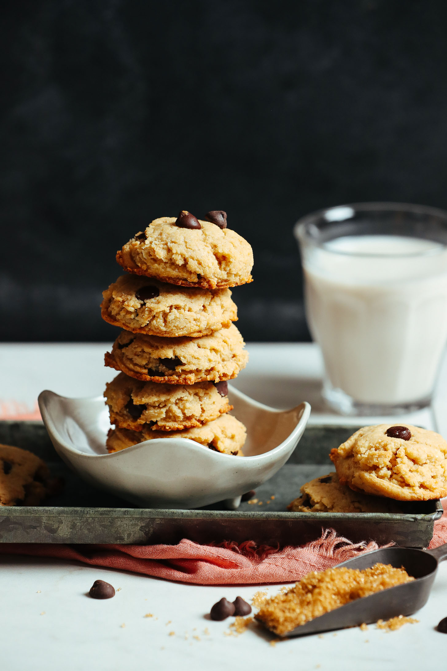 Bowl with a stack of gluten-free vegan chocolate chip cookies