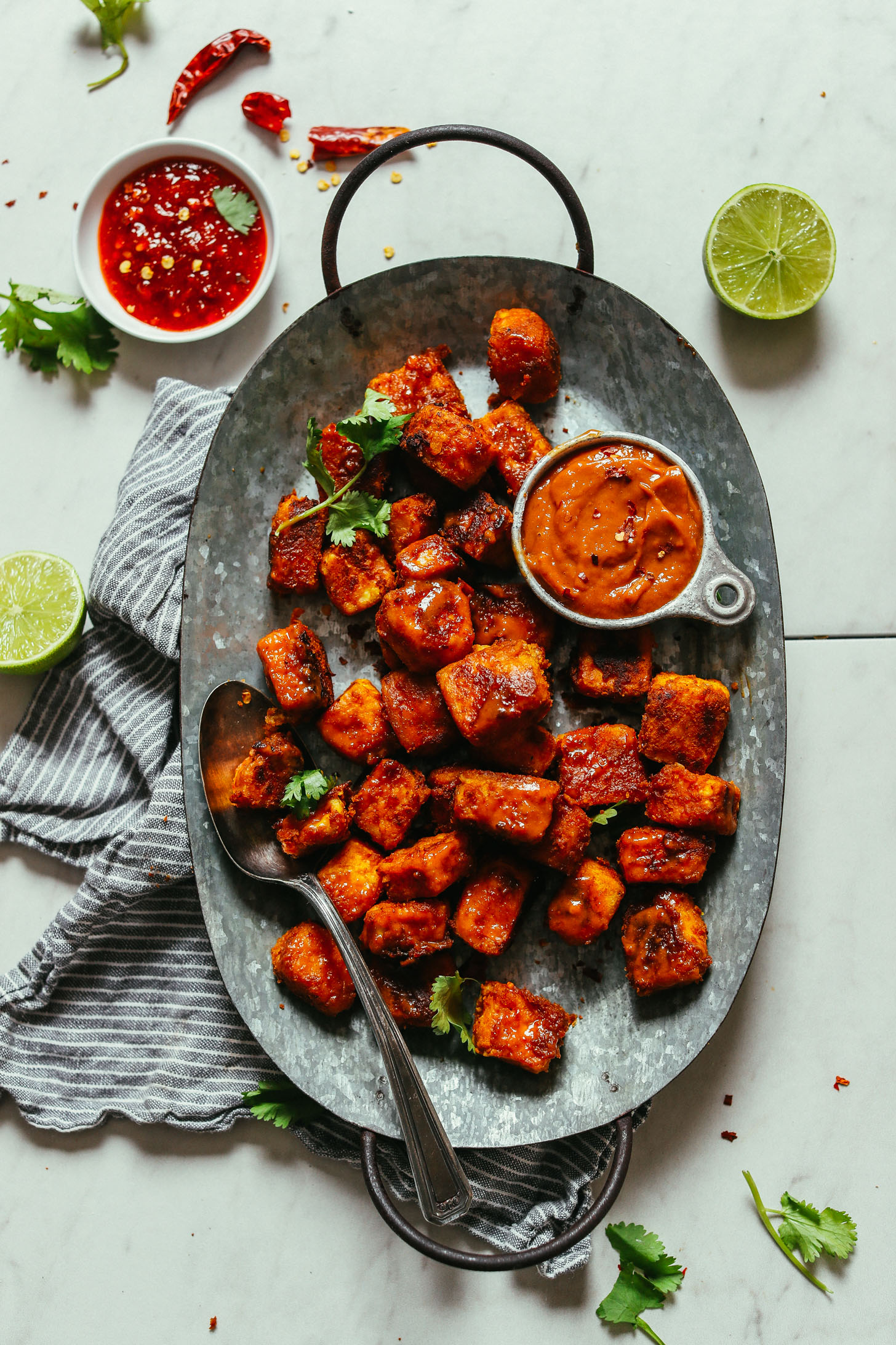 Tray filled with crispy, bite-sized pieces of our Quick & Easy Peanut Tofu recipe