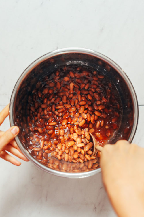 Stirring an Instant Pot of pinto beans