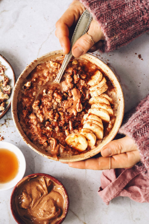 Bowl of Instant Pot steel cut oats topped with banana and cinnamon
