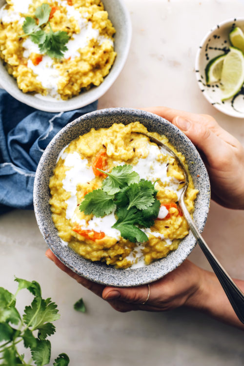 Holding a bowl of Instant Pot kitchari