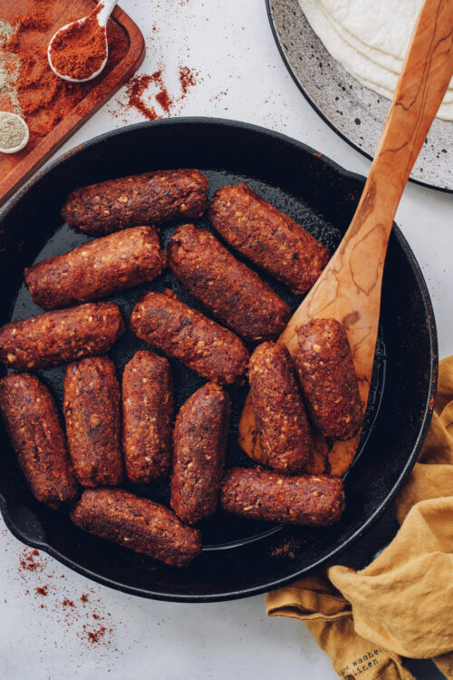 Skillet of vegan chorizo sausage links