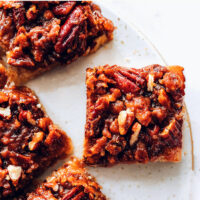 Vegan gluten-free pecan pie bars on a plate