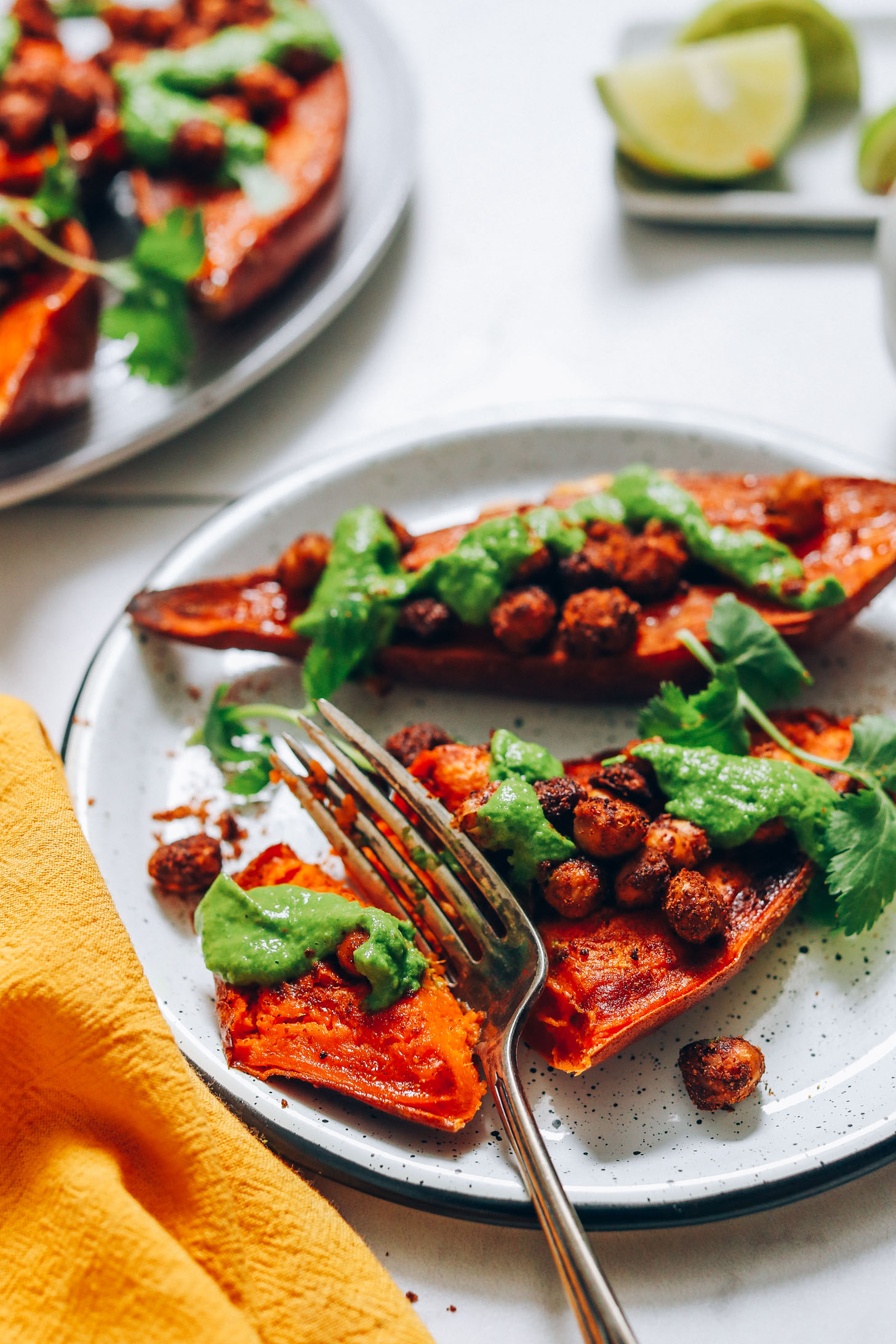 Stuffed sweet potatoes topped with tandoori masala chickpeas