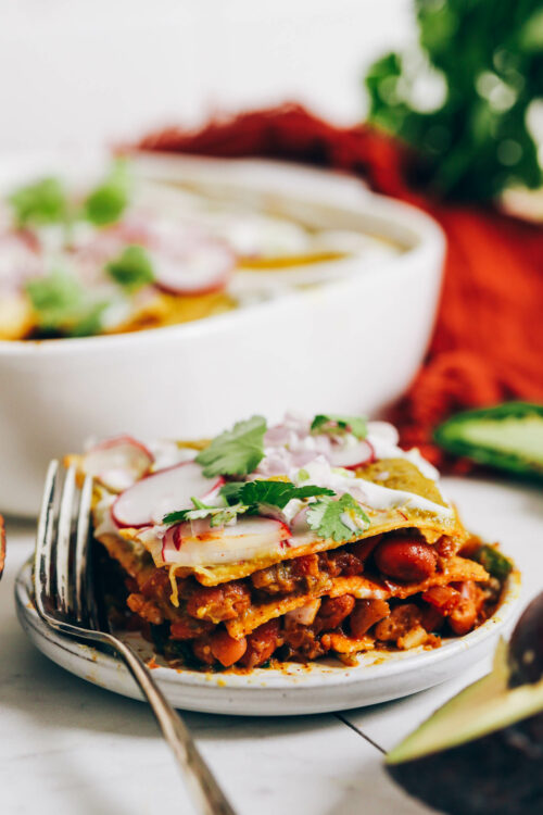 Plate and baking dish of our green enchilada bake recipe