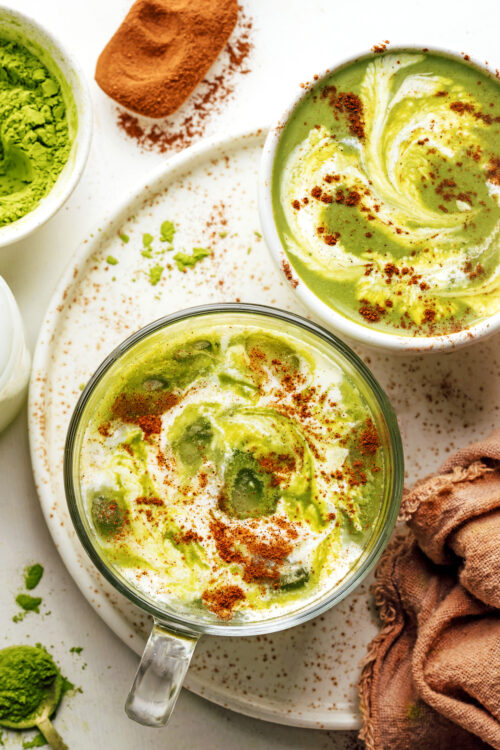 Two mugs of our pumpkin spice matcha latte recipe