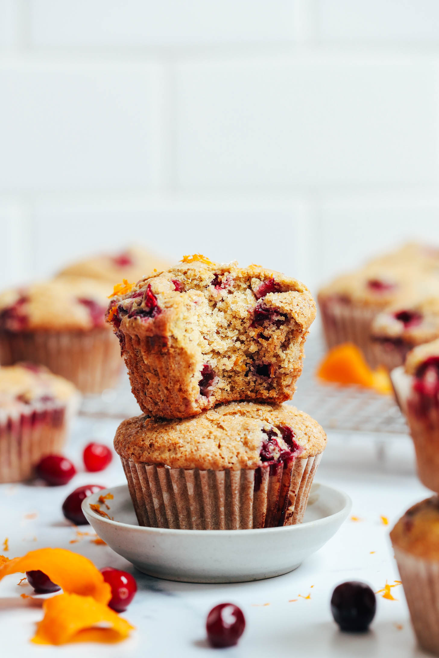 Stack of cranberry orange muffins 